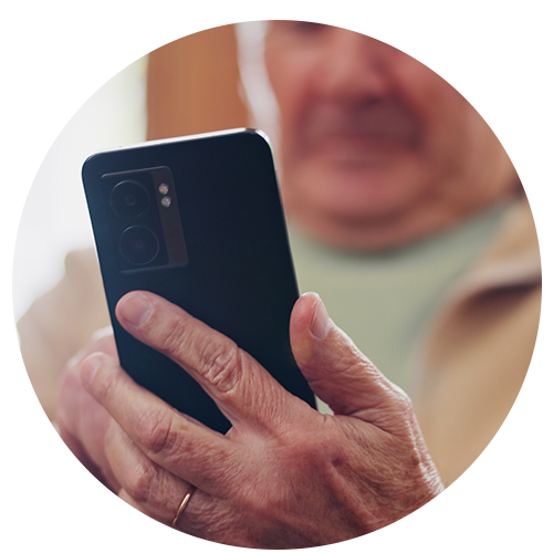 Smartphone and hands of senior man