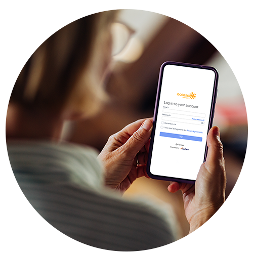 Woman Logging onto AlayaCare on Smartphone